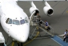 New Zealand - South island: Christchurch - airport - Passengers board an Air NZ BAe-160 airliner (photographer Rod Eime)