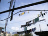 Nagorno Karabakh - Xankandi / Stepanakert: washing strung up between residential buildings - photo by A.Kilroy