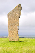 Orkney island, Mainland- Standing Stones of Stenness - Standing at a maximum height of six metres(around 19 feet) on the south-eastern shore of the Stenness Loch, onlyfour of the ring's original 12 stones remain. Radio-carbon dates have shownthat the site dates from at least 3100B - photo by Carlton McEachern