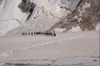 Pakistan - Baltoro Glacier - Karakoram mountains - Himalayan range - Northern Areas: line of Balti porters in the Baltoro Glacier - photo by A.Summers