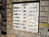 Swat district, North-West Frontier Province / NWFP, Pakistan: distances table at the Karakoram Highway obelisk, near Shiwi - FWO monument celebrating the construction of the KKH - photo by D.Steppuhn