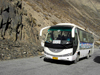 Khunjerab Pass, Hunza valley, Northern Areas / FANA - Pakistan-administered Kashmir: Chinese bus brings doing the Hunza tour - KKH - photo by D.Steppuhn