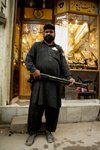 Lahore, Punjab, Pakistan: security guard armed with a shotgun in front of a jeweler - gold - photo by G.Koelman