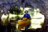 Rock Islands / Chelbacheb, Koror state, Palau: sea Kayaker in cave - photo by B.Cain