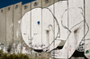 near Bethlehem, West Bank, Palestine: graffitti on Wall - blowing - concrete slabs of the separation fence - photo by J.Pemberton