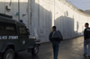 near Bethlehem, West Bank, Palestine: Israeli police vehicle patroling the wall - Israeli West Bank barrier - photo by J.Pemberton