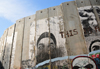 Bethlehem, West Bank, Palestine: faces on the Israeli West Bank barrier - fortified slabs of concrete - photo by M.Torres
