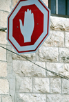 Bethlehem, West Bank, Palestine: Middle eastern stop sign with an hand - photo by M.Torres