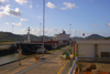 Panama Canal: Miraflores locks - the Chimborazo is towed by the locomotives - photo by H.Olarte