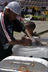 A young black man makes some shaved ice - Portobello, Coln, Panama - photo by H.Olarte
