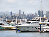 Panama City / Ciudad de Panama: Flamengo island marina - Amador causeway - yachts with Av. Balboa in the backgroud - photo by M.Torres