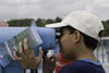 Galeta Island, Coln province, Panama: young latino boy looking thru a telescope - Smithsonian Tropical Research Institute, Galeta Point - photo by H.Olarte