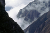 Runkuraquay, Cuzco region, Peru: low lying clouds shroud the mountains in mystery - Inca Trail - Peruvian Andes - photo by C.Lovell