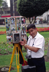 Miraflores, Lima, Peru: photographer with old time camera with photos in the main - photo by C.Lovell