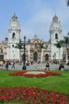 Lima, Peru: the Cathedral and flowers on Plaza de Armas - Francisco Pizarros' remains are in the interior - photo by M.Torres