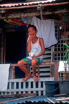 Manila city, Philippines - happy boy with Jesus icon - Slums and shanty towns - photo by B.Henry