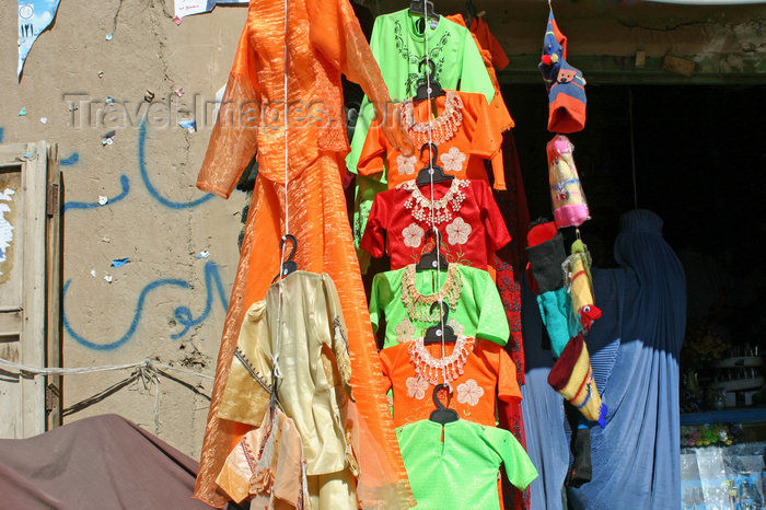 afghanistan29: Afghanistan - Herat province - shop with girls' clothes with two women in burkas shopping - photo by E.Andersen - (c) Travel-Images.com - Stock Photography agency - Image Bank