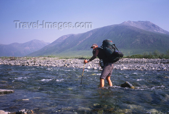 alaska142: Brooks range, Alaska: crossing a river during the South-North Alaska expedition - photo by E.Petitalot - (c) Travel-Images.com - Stock Photography agency - Image Bank