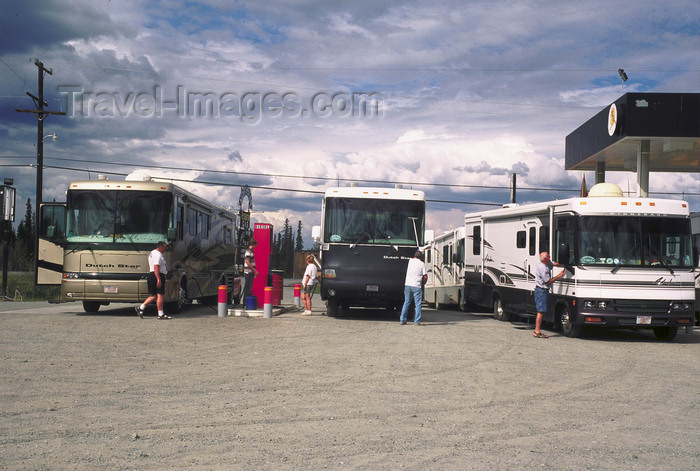 alaska172: Alaska - Fairbanks: American tourists get fuel in an Alaska fuel station - campers - photo by E.Petitalot - (c) Travel-Images.com - Stock Photography agency - Image Bank