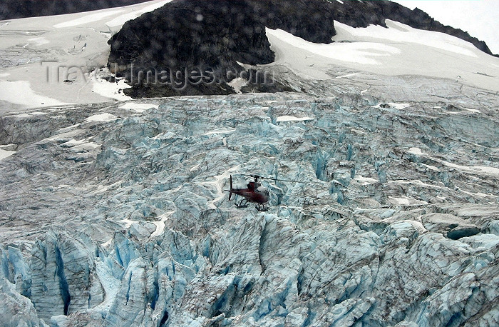 alaska94: Alaska - Skagway: an helicopter over Denver Glacier (photo by Robert Ziff) - (c) Travel-Images.com - Stock Photography agency - Image Bank