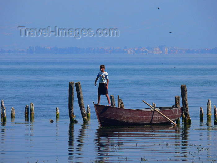 albania179: Pogradec, Korçë County, Albania: Ohrid Lake - a boy and his boat - photo by J.Kaman - (c) Travel-Images.com - Stock Photography agency - Image Bank