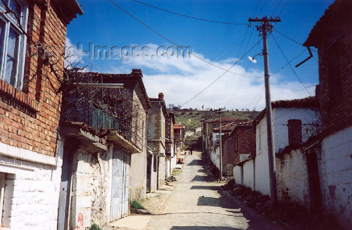 albania25: Albania / Shqiperia - Korçë / Korça / Korce: up hill to the Heroes' Cemetery and the grand monument built by Enver Hoxha, under the Morava mountain - photo by M.Torres - (c) Travel-Images.com - Stock Photography agency - Image Bank