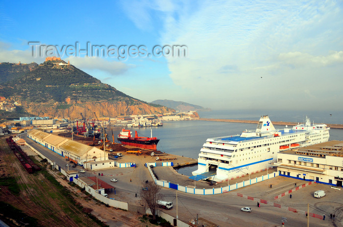 algeria185: Oran, Algeria / Algérie: harbor - Bassin d'Arzew - Alicante ferry El Djazair II and Harbour Station - Djebel Murdjadjo mountain in the background - photo by M.Torres | le port - Bassin d'Arzew - ferry pour Alicante, l'El Djazair II et le Arctic Stream - Gare Maritime - montagne Djebel Murdjadjo - (c) Travel-Images.com - Stock Photography agency - Image Bank