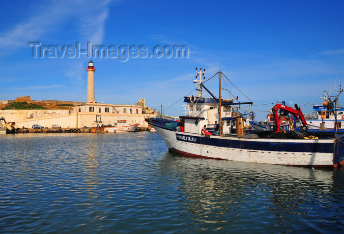 algeria449: Cherchell - Tipasa wilaya, Algeria / Algérie: harbour - fishing boat 'Hadj Taiab' and the lighthouse | port - bateau de pêche 'Hadj Taiab' et le phare - photo by M.Torres - (c) Travel-Images.com - Stock Photography agency - Image Bank