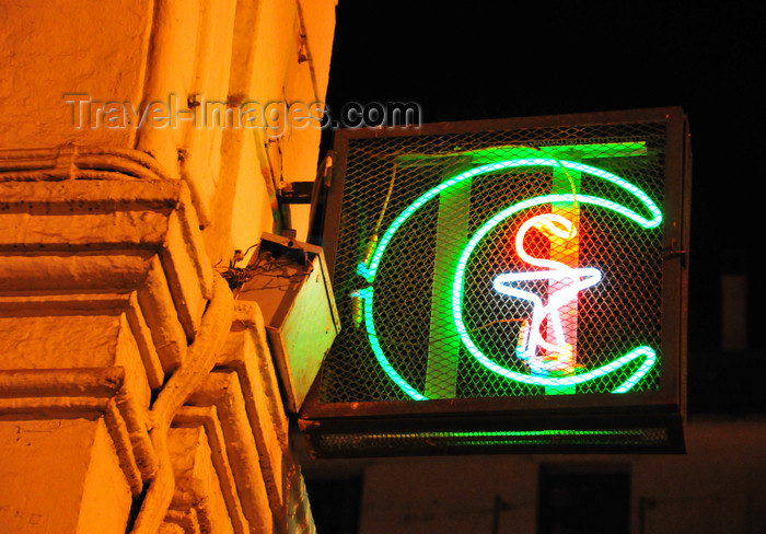 algeria552: Algiers / Alger - Algeria / Algérie: neon sign - a pharmacy is signaled by a crescent - Ahmed Bouzrina street, Port Said square | tube néon - une pharmacie est signalée par un croissant - rue Ahmed Bouzrina, ex-rue de La Lyre - Place Port Said, ex-Bresson - photo by M.Torres - (c) Travel-Images.com - Stock Photography agency - Image Bank