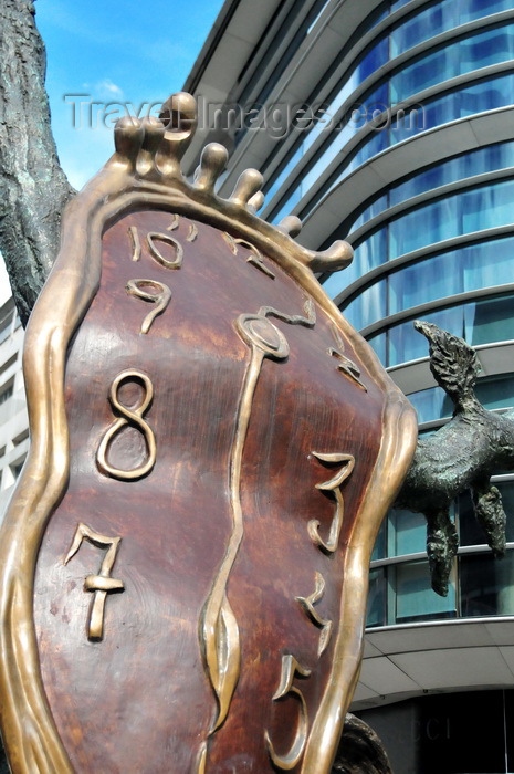 andorra48: Andorra la Vella, Andorra: bronze sculpture 'La noblesse du temps', Salvador Dalí, donated by Enric Sabater i Bonany - 'The Nobility of Time' sculpture invokes iconic 'The Persistence of Memory' painting through the soft watch on a tree, a Surrealist  meditation on the relativity of space and time - Pont de la Rotonda - photo by M.Torres - (c) Travel-Images.com - Stock Photography agency - Image Bank