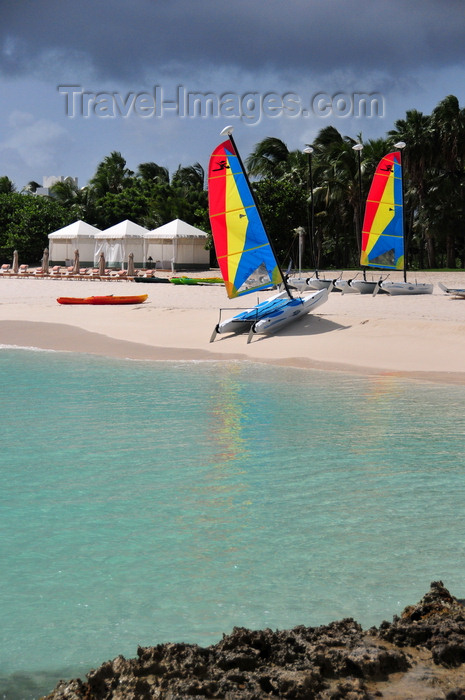 anguilla35: Maundays Bay, West End Village, Anguilla: white sand beach with turqoise water - mini-catamarans and beach gazebos - Cap Juluca five-star resort - photo by M.Torres - (c) Travel-Images.com - Stock Photography agency - Image Bank