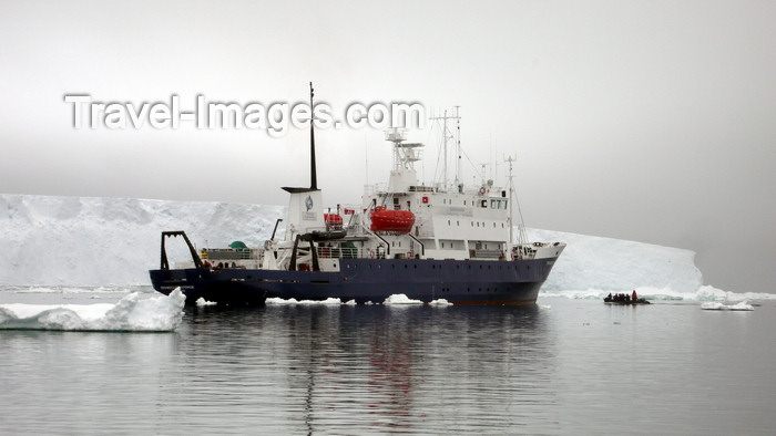 antarctica23: George V Coast, East Antarctica: expedition vessel, Spirit of Enderby / Professor Khromov in front of a massive iceberg, once part of the Mertz Glacier tongue - Southern Ocean - photo by R.Eime - (c) Travel-Images.com - Stock Photography agency - Image Bank