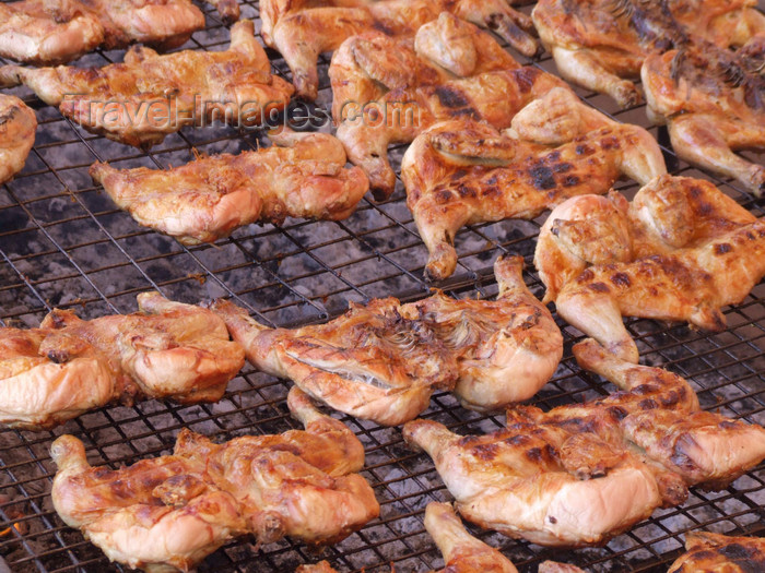 argentina237: Argentina - Puerto Iguazu - chicken BBQ - images of South America by M.Bergsma - (c) Travel-Images.com - Stock Photography agency - Image Bank