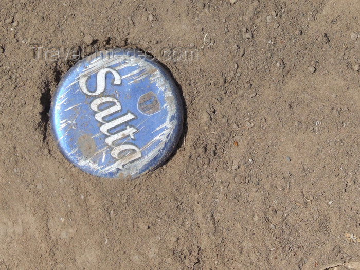 argentina271: Argentina - Salta - Salta beer - bottle capsule and dust - images of South America by M.Bergsma - (c) Travel-Images.com - Stock Photography agency - Image Bank