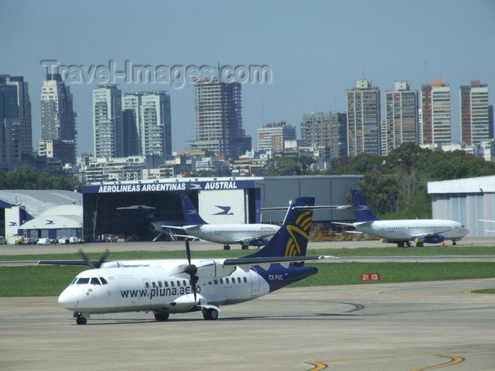 argentina301: Argentina - Buenos Aires - Airplanes waiting at Aeroparque Jorge Newbery - CX-PUC - Pluna  Aérospatiale ATR-42-320 - images of South America by M.Bergsma - (c) Travel-Images.com - Stock Photography agency - Image Bank