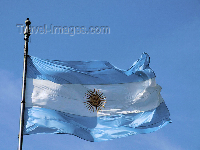 argentina303: Argentina - Buenos Aires - Argentinean Flag at the Plaza de Mayo - images of South America by M.Bergsma - (c) Travel-Images.com - Stock Photography agency - Image Bank