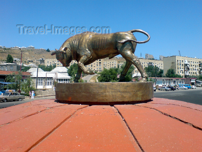 azer207: Azerbaijan - Hovsani settlement - Absheron peninsula: round-about with bull - photo by N.Mahmudova - (c) Travel-Images.com - Stock Photography agency - Image Bank