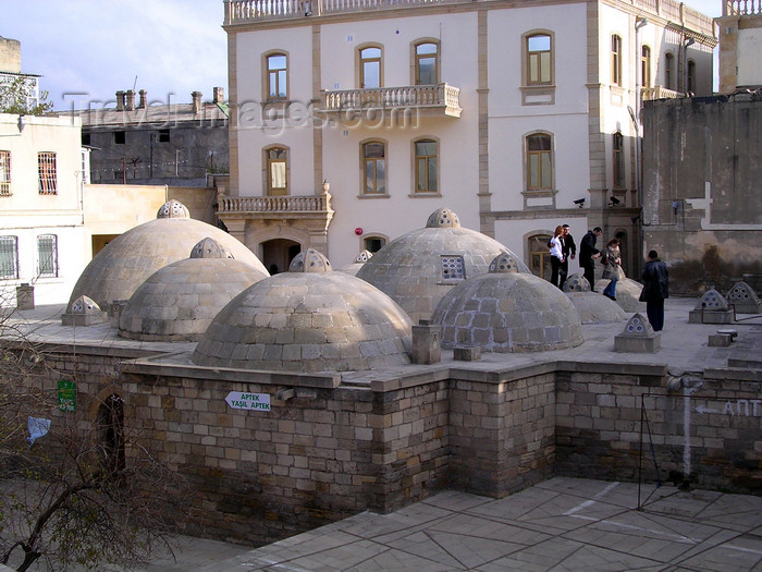 azer517: Baku, Azerbaijan: people on the domes of the Hadji Haib baths - Icheri-Shekher - old city - photo by G.Monssen - (c) Travel-Images.com - Stock Photography agency - Image Bank