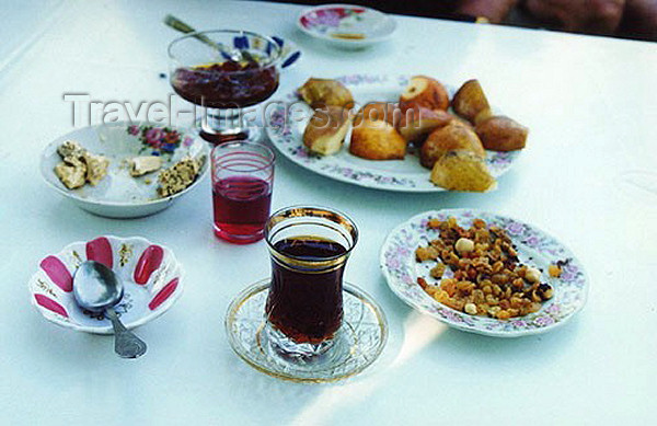 azer94: Azerbaijan - Baku: Azeri tea in an armud - pear shapped glass, with jam and nuts (photo by Galen Frysinger) - (c) Travel-Images.com - Stock Photography agency - Image Bank