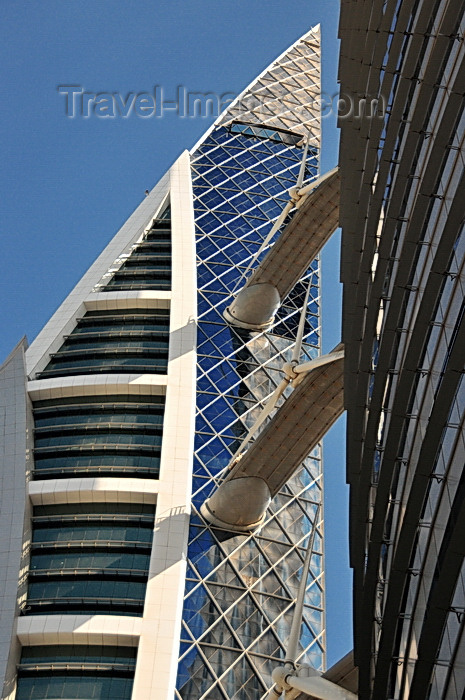 bahrain26: Manama, Bahrain: Bahrain World Trade Center - BWTC - the first skyscrapers to integrate wind turbines - other energy conscious elements are solar-powered external lighting, low-energy fluorescent lighting and thermal insulation for opaque fabric elements  - King Faisal Highway - photo by M.Torres - (c) Travel-Images.com - Stock Photography agency - Image Bank