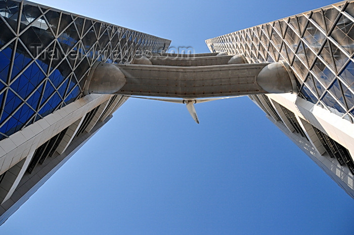 bahrain33: Manama, Bahrain: Bahrain World Trade Center - BWTC - seen from below - the towers are linked via three skybridges, each holding a 225 kW wind turbine - green architecture, collaboration between Atkins architects and engineers and turbine specialists Norwin - photo by M.Torres - (c) Travel-Images.com - Stock Photography agency - Image Bank