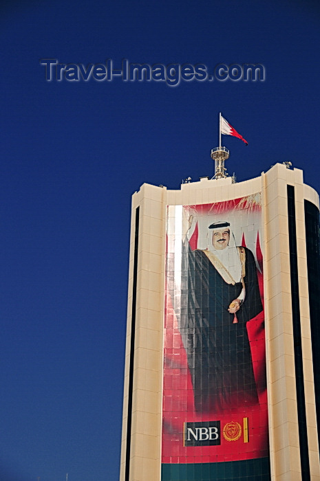 bahrain42: Manama, Bahrain: the King's image at thr National Bank of Bahrain building - Hamad bin Isa Al Khalifa personality cult - Abbey, Hanson, Rowe and Partners architects - photo by M.Torres - (c) Travel-Images.com - Stock Photography agency - Image Bank