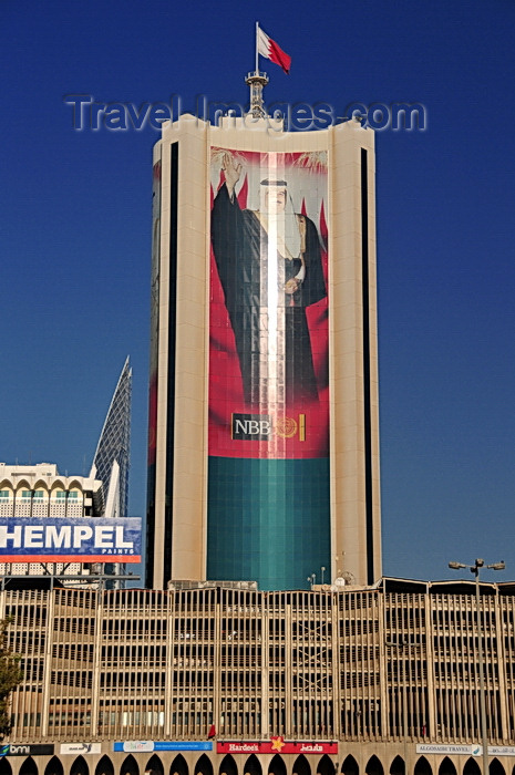 bahrain48: Manama, Bahrain: car park building and National Bank of Bahrain - the King's image in giant format - photo by M.Torres - (c) Travel-Images.com - Stock Photography agency - Image Bank