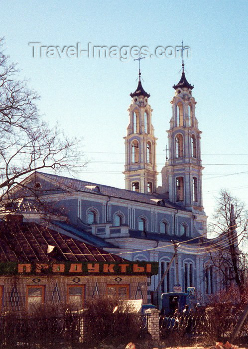 belarus8: Belarus - Ashmjany / Oshmyany, Grodno / Hrodna voblast: Catholic church of St. Michael the Archangel and shop - material and spiritual - photo by M.Torres - (c) Travel-Images.com - Stock Photography agency - Image Bank