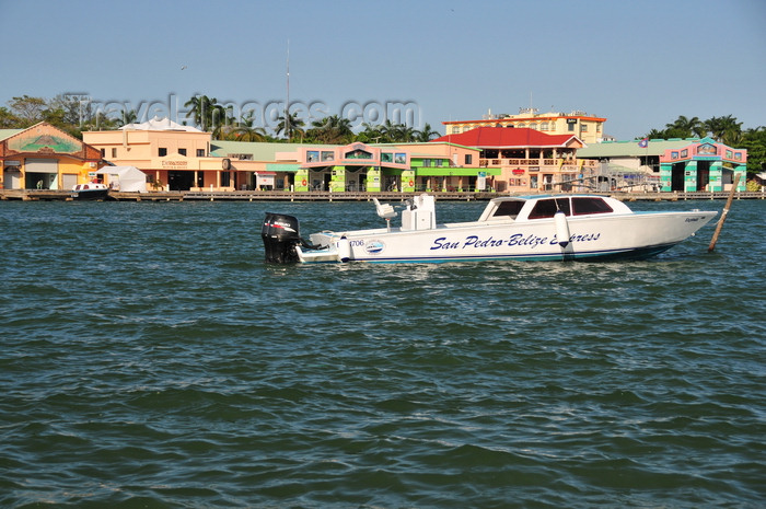 belize108: Belize City, Belize: boat used in San Pedro-Belize express service - shops and bars of Belize City Tourism Village and Radisson Fort George - mouth of Haulover Creek - photo by M.Torres - (c) Travel-Images.com - Stock Photography agency - Image Bank