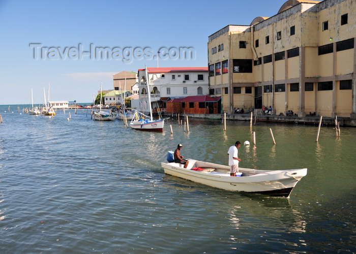 belize118: Belize City, Belize: Haulover Creek near the Commercial Center - small boat entering the creek - view from the Swing bridge - photo by M.Torres - (c) Travel-Images.com - Stock Photography agency - Image Bank