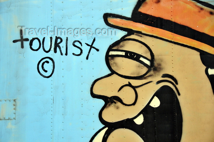 belize92: San Ignacio, Cayo, Belize: graffiti on an old truck - by 'Tourist' - photo by M.Torres - (c) Travel-Images.com - Stock Photography agency - Image Bank
