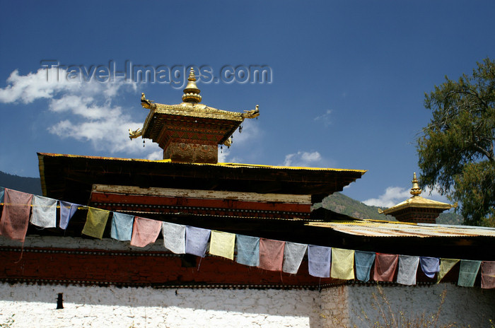 bhutan108: Bhutan - Paro dzongkhag - Bhuddist prayer flags and the roof of Kyichu Lhakhang, near Paro - photo by A.Ferrari - (c) Travel-Images.com - Stock Photography agency - Image Bank