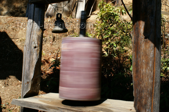 bhutan131: Bhutan - Paro dzongkhag - rotating prayer wheel, near Taktshang Goemba - photo by A.Ferrari - (c) Travel-Images.com - Stock Photography agency - Image Bank