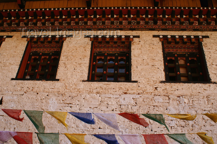 bhutan140: Bhutan - Paro dzongkhag - Prayer flags, in front of the walls of Taktshang Goemba - photo by A.Ferrari - (c) Travel-Images.com - Stock Photography agency - Image Bank